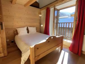 Кровать или кровати в номере Chalet Reves des Cimes