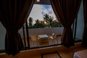 O zonă de relaxare la Harbour View Resort & Apartment