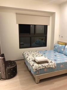 Ένα ή περισσότερα κρεβάτια σε δωμάτιο στο Ocean Holiday