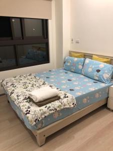 Ένα ή περισσότερα κρεβάτια σε δωμάτιο στο Ocean Holiday