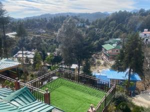 Bazén v ubytování Khushi Cottage nebo v jeho okolí