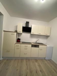 Køkken eller tekøkken på Modernes Apartment in der Nähe zum Casino