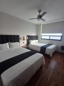 Ένα ή περισσότερα κρεβάτια σε δωμάτιο στο Hotel Sicilia Italia