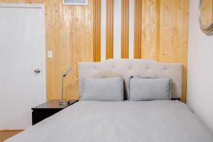 Ένα ή περισσότερα κρεβάτια σε δωμάτιο στο Four trees house