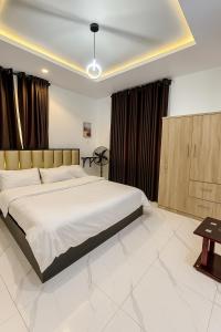 Ένα ή περισσότερα κρεβάτια σε δωμάτιο στο Wells 1 One Bedroom Apartment