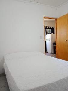 Ένα ή περισσότερα κρεβάτια σε δωμάτιο στο Depto Cerezos