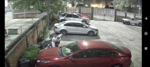 two cars parked in a parking lot with a motorcycle at Cuarto 1 in Cuautitlán Izcalli