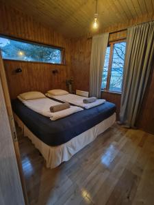 Ένα ή περισσότερα κρεβάτια σε δωμάτιο στο Aris place +11 φωτογραφίες