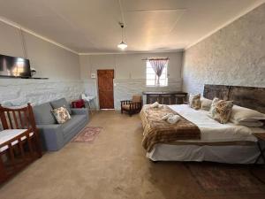 Ένα ή περισσότερα κρεβάτια σε δωμάτιο στο Carlton Heights Guesthouse