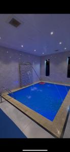 Πισίνα στο ή κοντά στο شاليهات منازل الشفا لبيوت العطلات