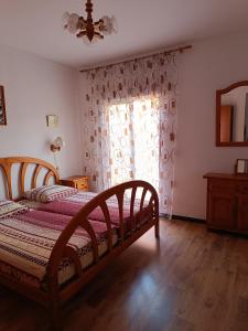 Ένα ή περισσότερα κρεβάτια σε δωμάτιο στο Burriana