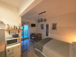 Η κουζίνα ή μικρή κουζίνα στο Residence Villa Alba - Suite Disposition 555 Al Vittoriale