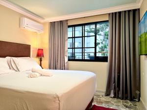 Postel nebo postele na pokoji v ubytování DUO BOUTIQUE HOTEL + 131 fotografií