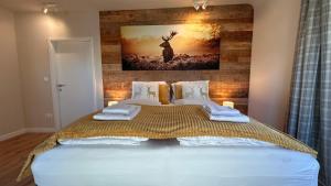 En eller flere senge i et værelse på Landhaus Vorderberg - Appartementen + 105 billeder