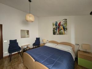 Ένα ή περισσότερα κρεβάτια σε δωμάτιο στο La Dimora Di Pienza