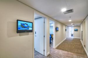 Телевизор и/или развлекательный центр в Transamerica Executive Paulista