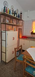 Køkken eller tekøkken på Cabañas Adolfo y María