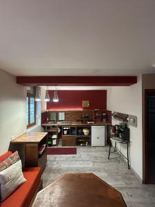 A kitchen or kitchenette at Le Saint-Vaast