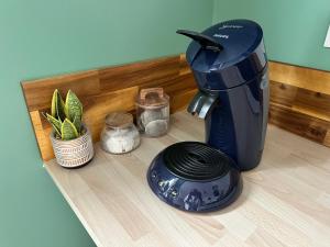 Kaffe- og tefaciliteter på Petit coin Cosy derrière la gare