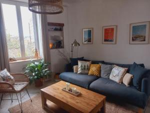 Χώρος καθιστικού στο Le Logis du Moulin Gîte avec Jacuzzi, à 800m de la Cité Médiévale +20 φωτογραφίες