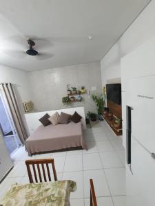 En eller flere senge i et værelse på Casa superior - aconchegante e bom custo benefício