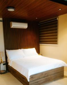 Giường trong phòng chung tại Aayah Family Escape +2 ảnh