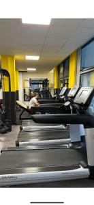 a row of empty treadmills in a gym at Sky Aslan Mostar in Mostar