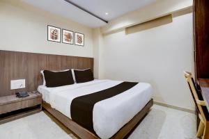 Postel nebo postele na pokoji v ubytování Hotel O Casa Royal Residency