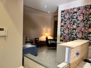 Ένα ή περισσότερα κρεβάτια σε δωμάτιο στο Don Carlo