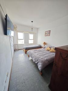 TV a/nebo společenská místnost v ubytování Monoambiente en Necochea frente a la playa hasta 4 personas