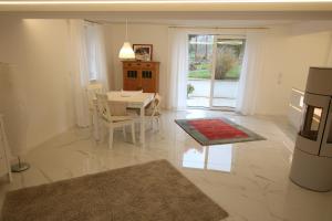 Posezení v ubytování Schicke Ferienwohnung für 2 + 9 fotografií