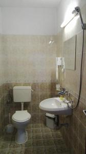 Koupelna v ubytování Tsvetkovi Guest House + 15 fotografií