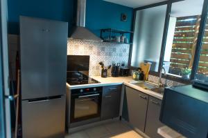 Køkken eller tekøkken på Le Reflet de l'Etang + 12 billeder