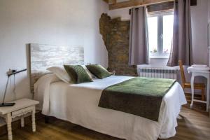 Ένα ή περισσότερα κρεβάτια σε δωμάτιο στο El Mirador de Armaño G-10235