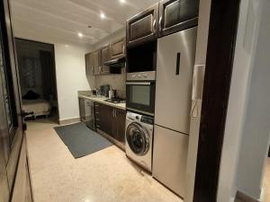 O bucătărie sau chicinetă la Rêve de MARRAKECH