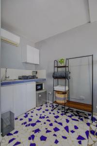 Η κουζίνα ή μικρή κουζίνα στο Mini departamento a una cuadra de la playa y de la bahia de Bocagrande