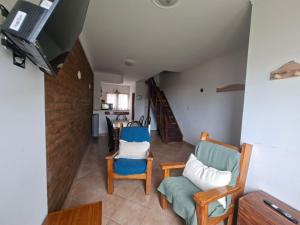 Et tv og/eller underholdning på Tranquilo duplex frente al mar