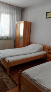 Postel nebo postele na pokoji v ubytování Tsvetkovi Guest House