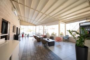 a living room with a couch and a table at Petra Boutique Hotel in Wadi Musa