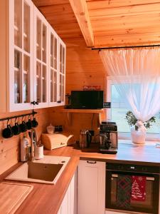 a kitchen with a sink and a counter top at Agroturystyka AKPólko in Biała Podlaska