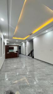 a large empty room with a large tile floor at Hiếu Sang 68 Hostel & Villas Seaview Bến tàu Rạch Giá miễn phí xe đón tiễn 24l24 in Rach Gia +291 photos