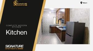 Η κουζίνα ή μικρή κουζίνα στο Signature Apartments