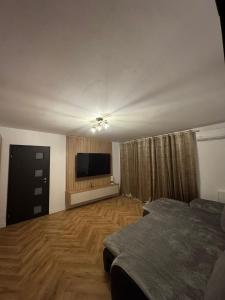 Postel nebo postele na pokoji v ubytování 1 Mai Apartament + 5 fotografií