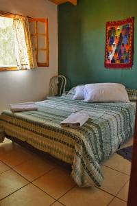 En eller flere senge i et værelse på Espacio de Montaña