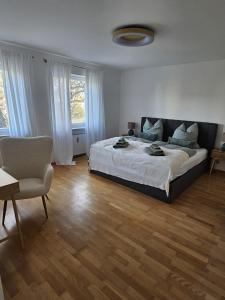 Ένα ή περισσότερα κρεβάτια σε δωμάτιο στο City-Apartments am Mühlbach-Kurpark