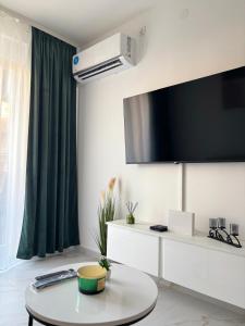 Et tv og/eller underholdning på Apartman Nona