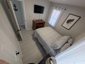 Ένα ή περισσότερα κρεβάτια σε δωμάτιο στο Hudson Oasis