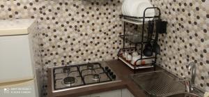 Una cocina o cocineta en Mikiami Semplicemente Accogliente