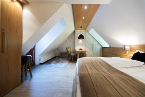 Postel nebo postele na pokoji v ubytování Hotel Im Krummbachtal + 13 fotografií