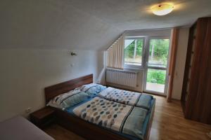Posteľ alebo postele v izbe v ubytovaní Apartment Imka
